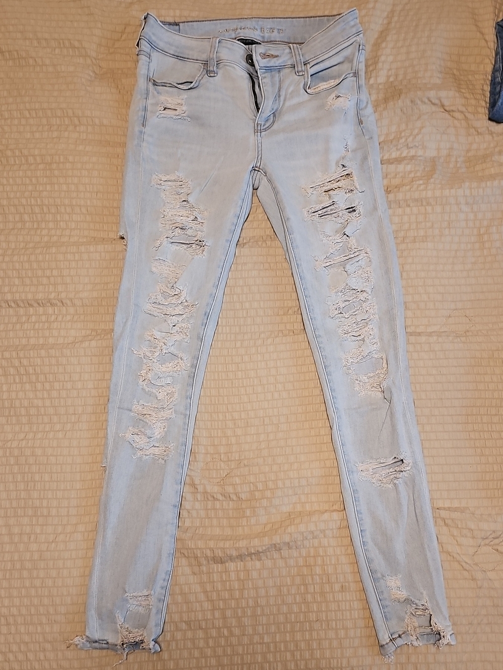 AE Light Wash Ripped Skinny Jeans
